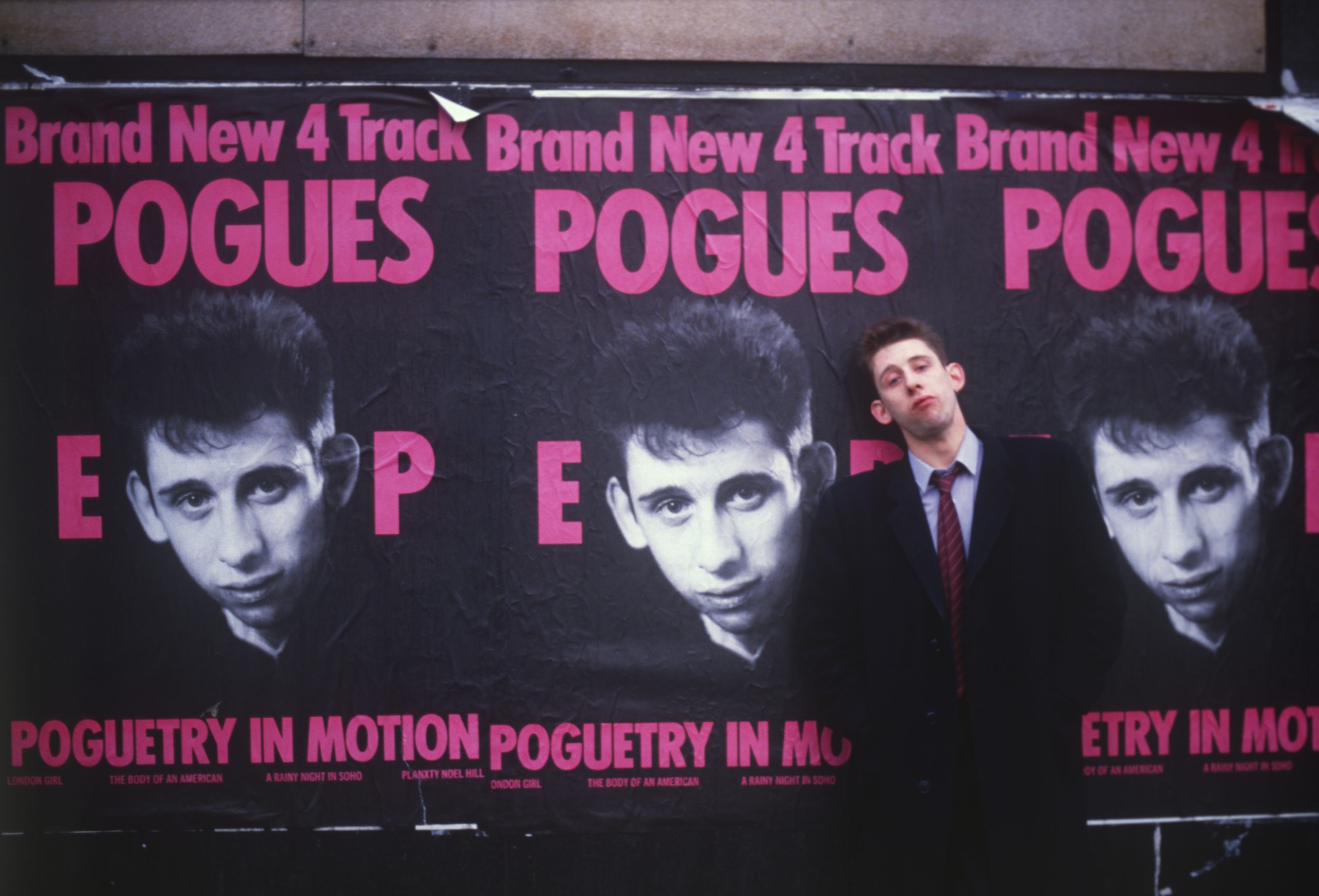 CoG 03 Shane & Pogues poster 1986 photo credit Andrew Caitlin