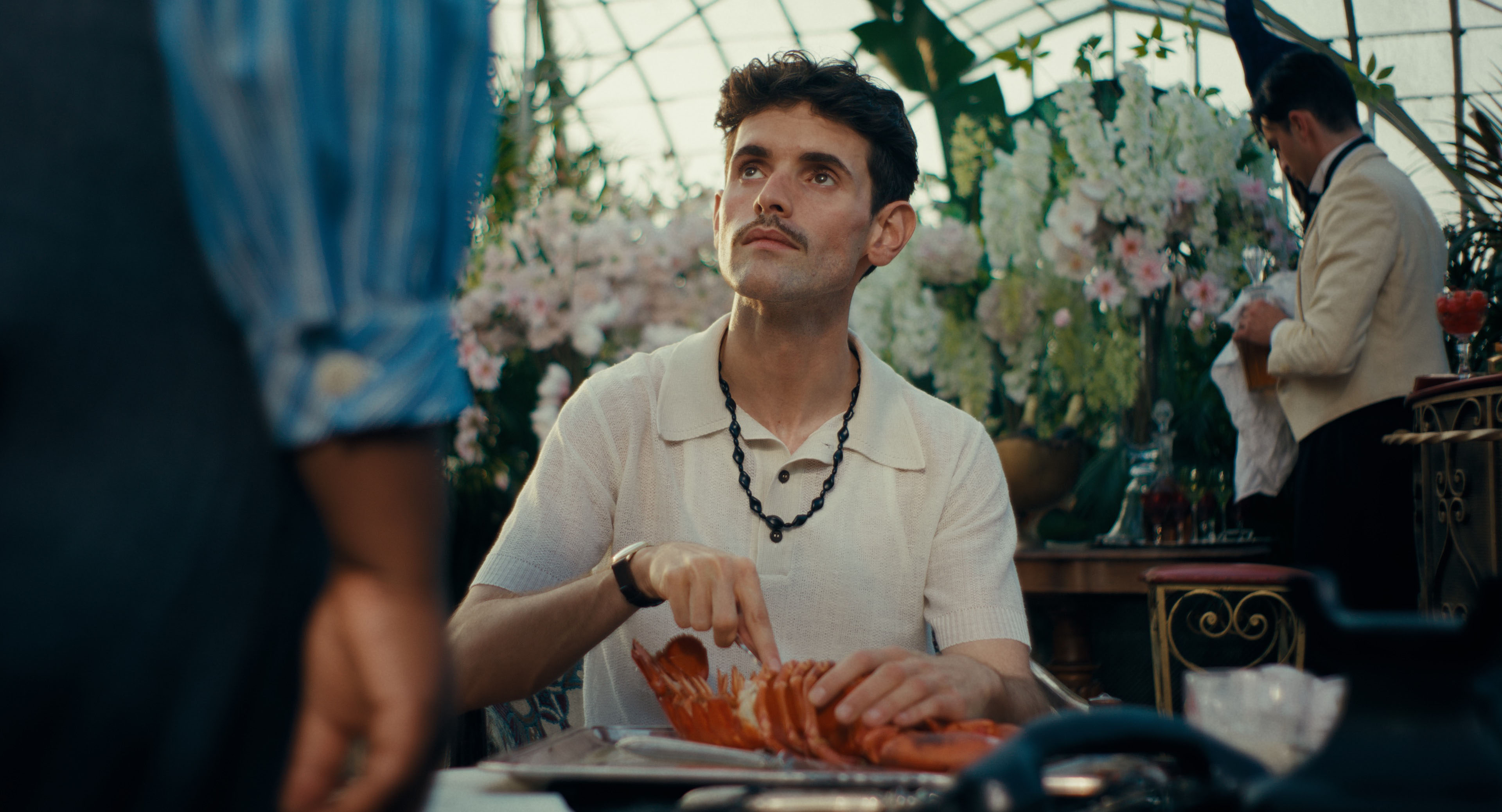 This-Is-Not-a-Murder-Mystery-Episodic-Photos-EP-3-3840x2076-TINAMM-S01EP03-Salvador-Dal-Tree-Bar-cutting-lobster-Copyright-PANENKA-jpg